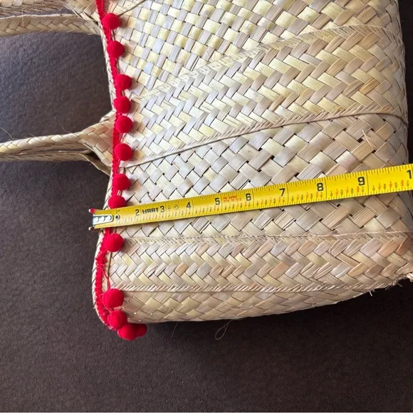 Handwoven Natural Straw Tote with Red Pom-Pom Trim - Picture 2 of 6